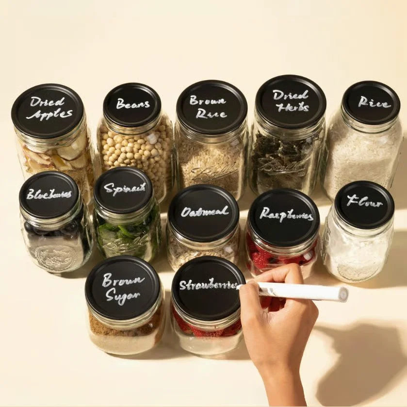 Chalkboard top lids on labeled mason jars